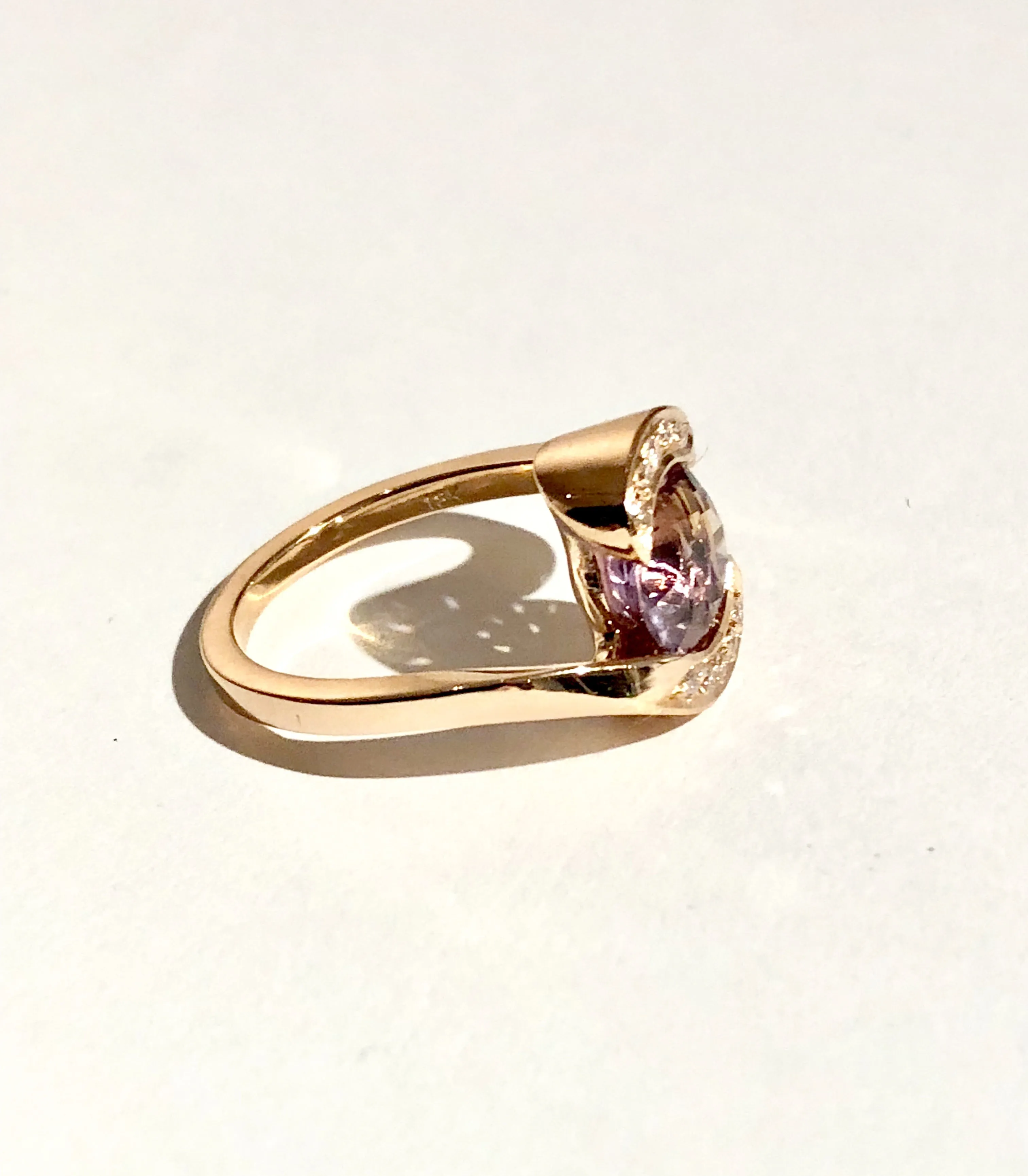 18k rose gold Bypass ring set with custom cut 8mm round Amertrine, pave set with 10 GH VS Canadian diamonds.