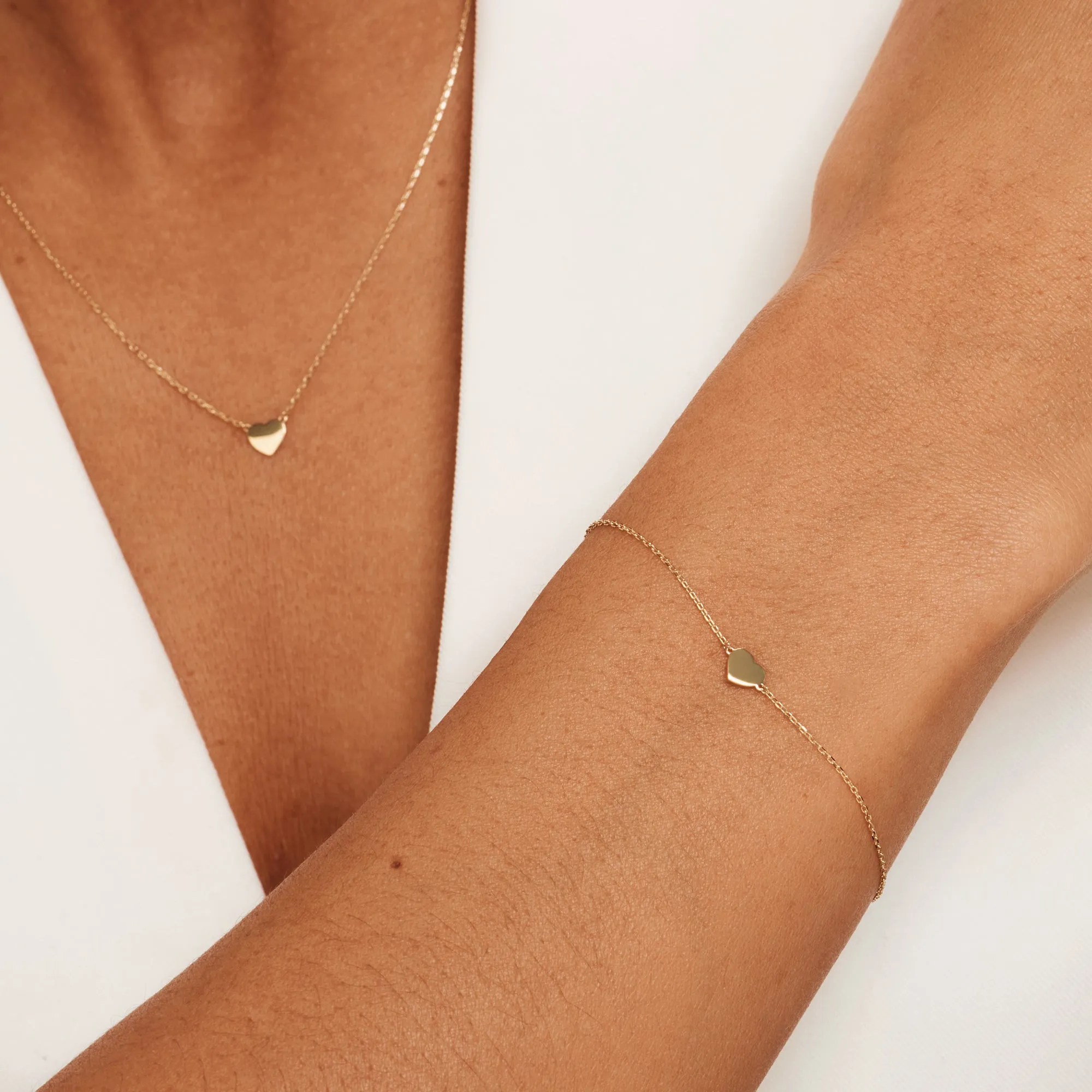 Cadeau d'Isabel 14 karat gold necklace and bracelet set with heart
