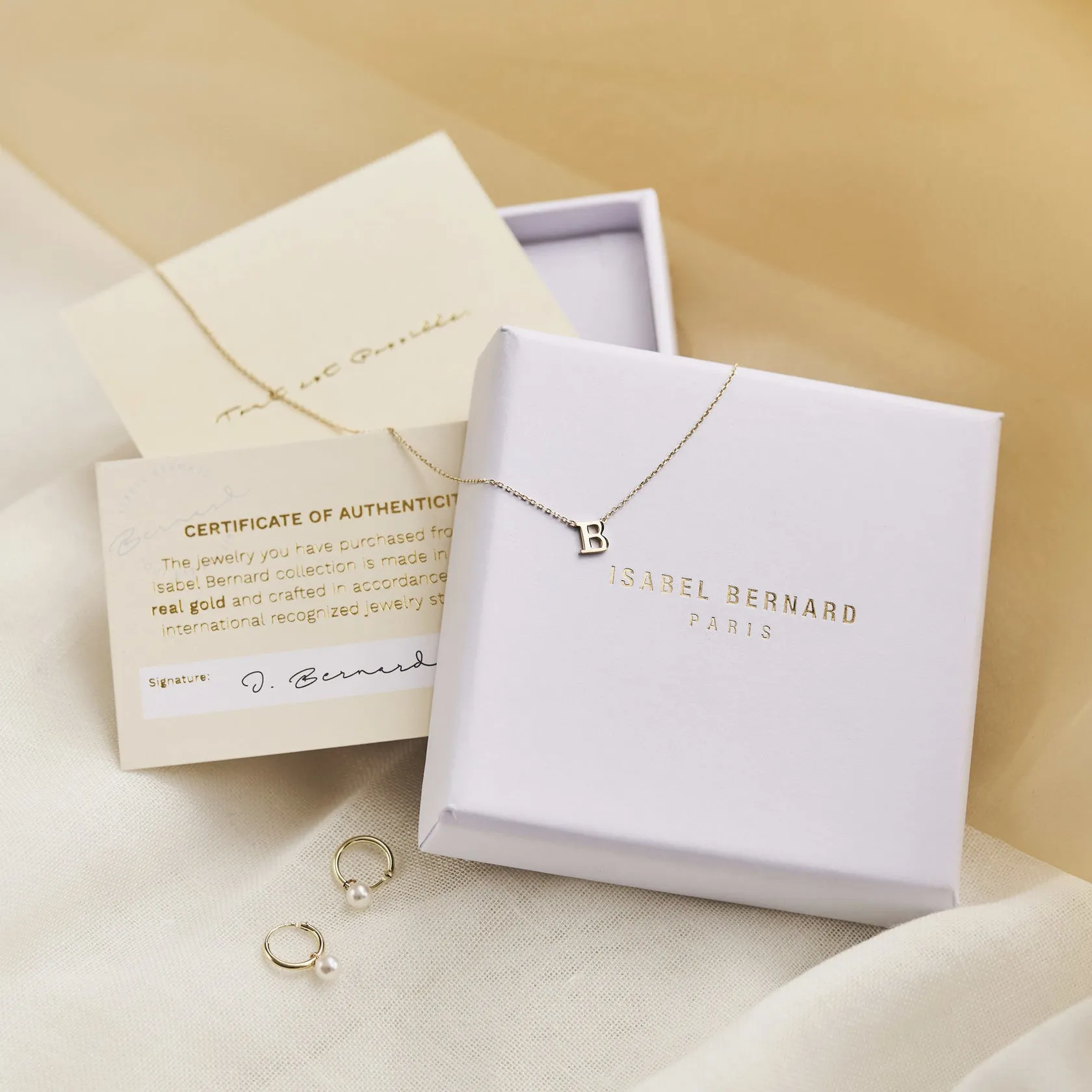 Cadeau d'Isabel 14 karat gold necklace and bracelet set with heart