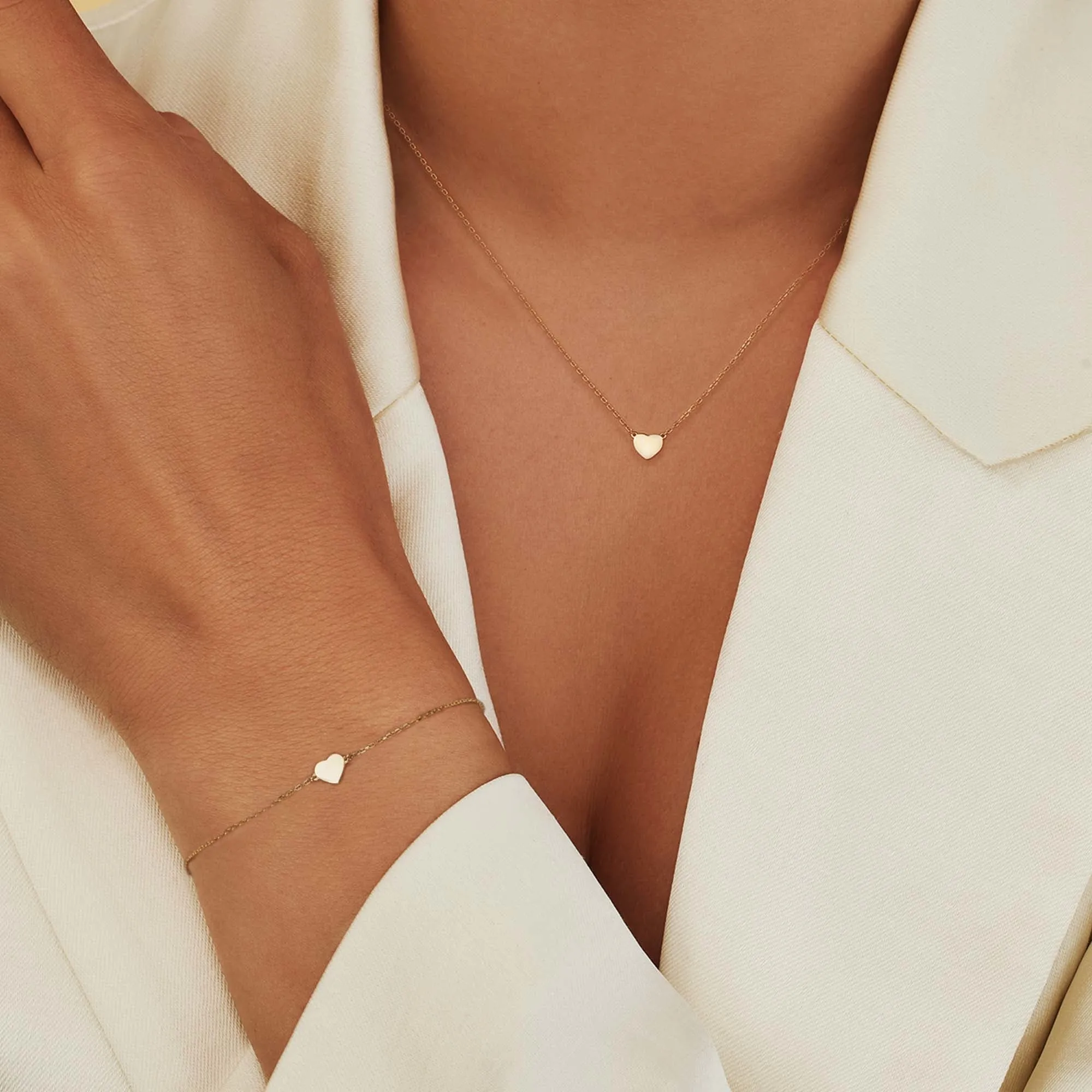 Cadeau d'Isabel 14 karat gold necklace and bracelet set with heart