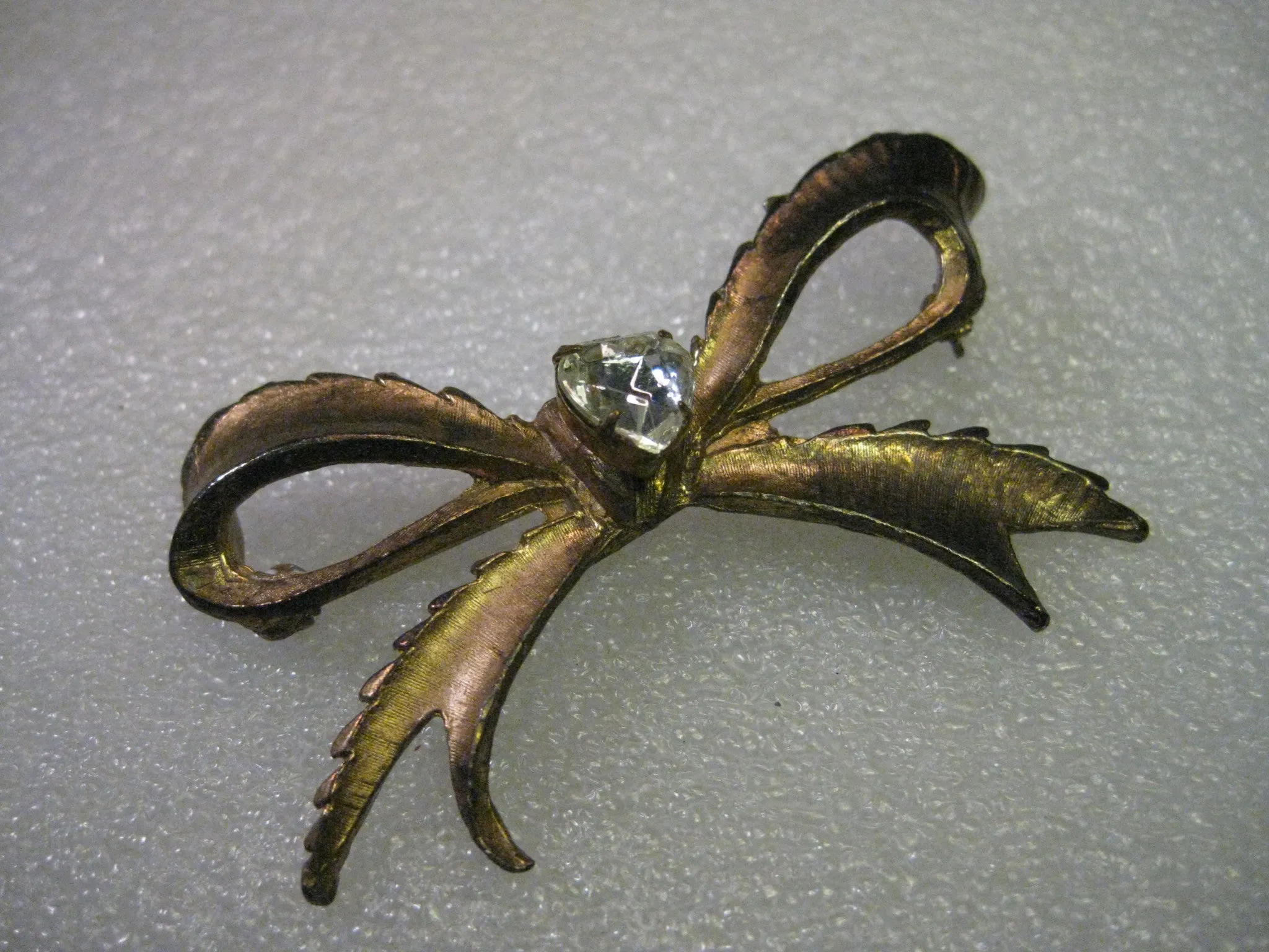 Vintage Goldtone Large Bow Brooch with Center Heart Clear Rhinestone